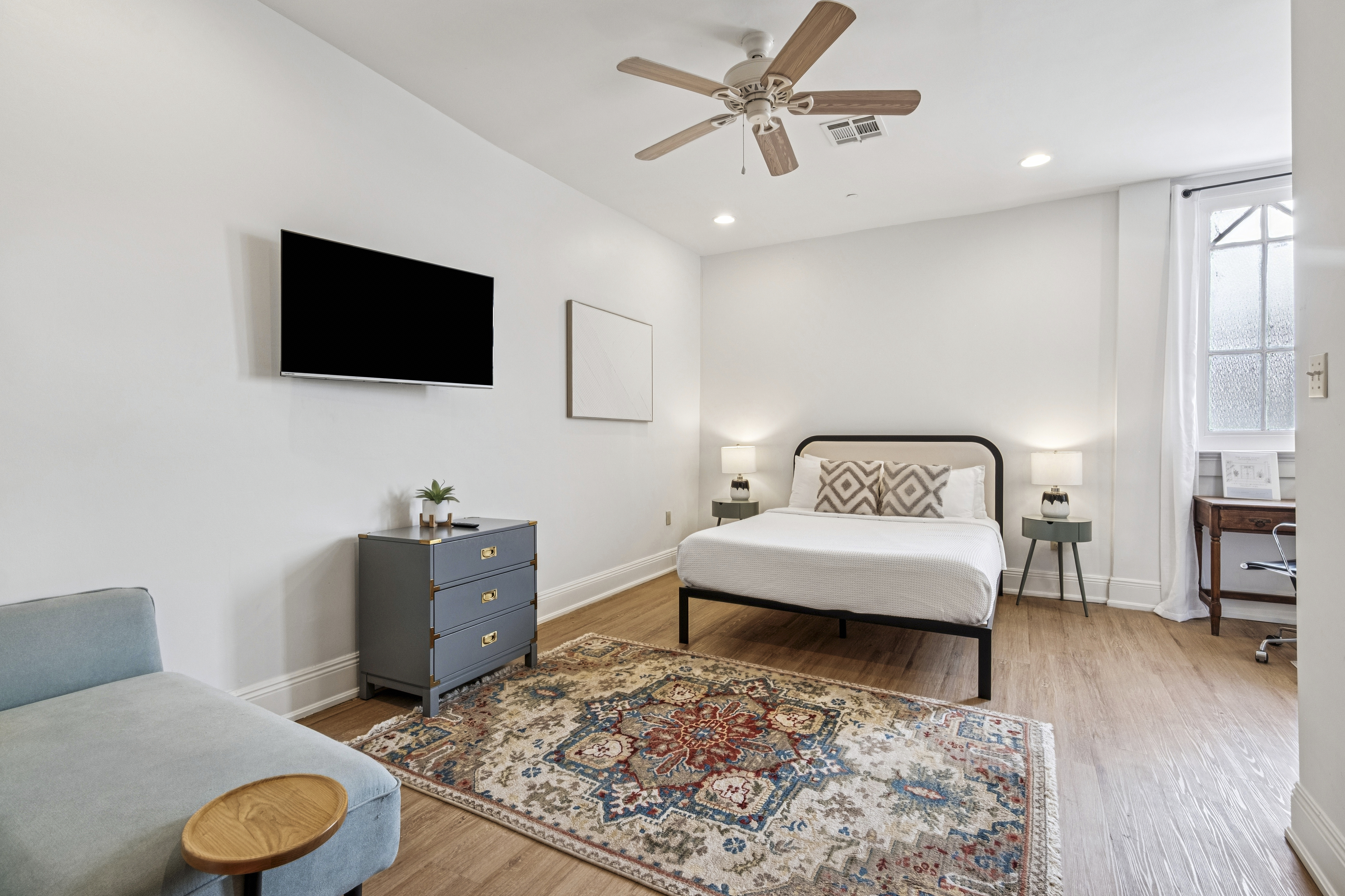 The Studio at Unit 201, a bright open studio with a queen bed, kitchen and sitting area