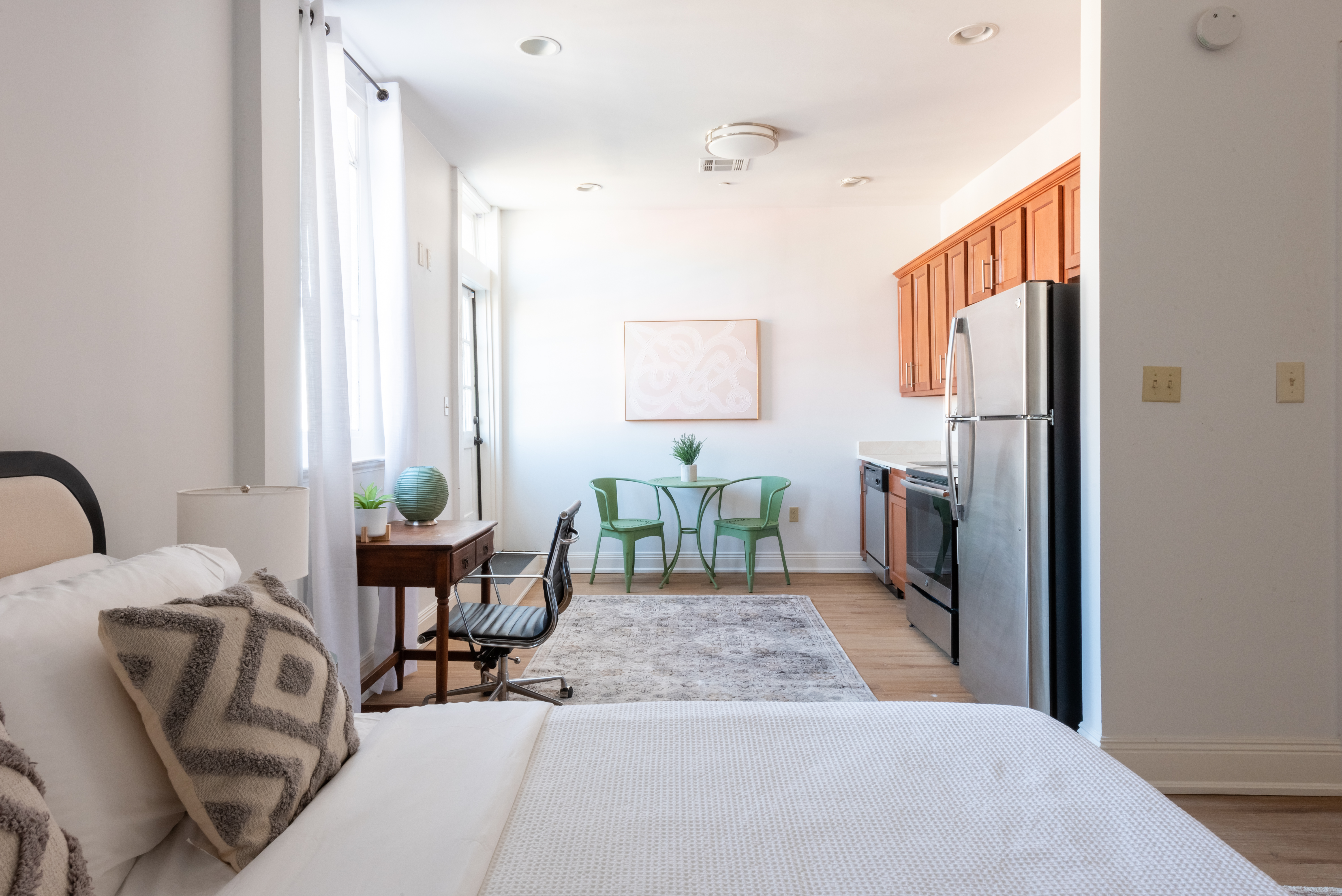 Unit 201 kitchen with stainless appliances and dishwasher