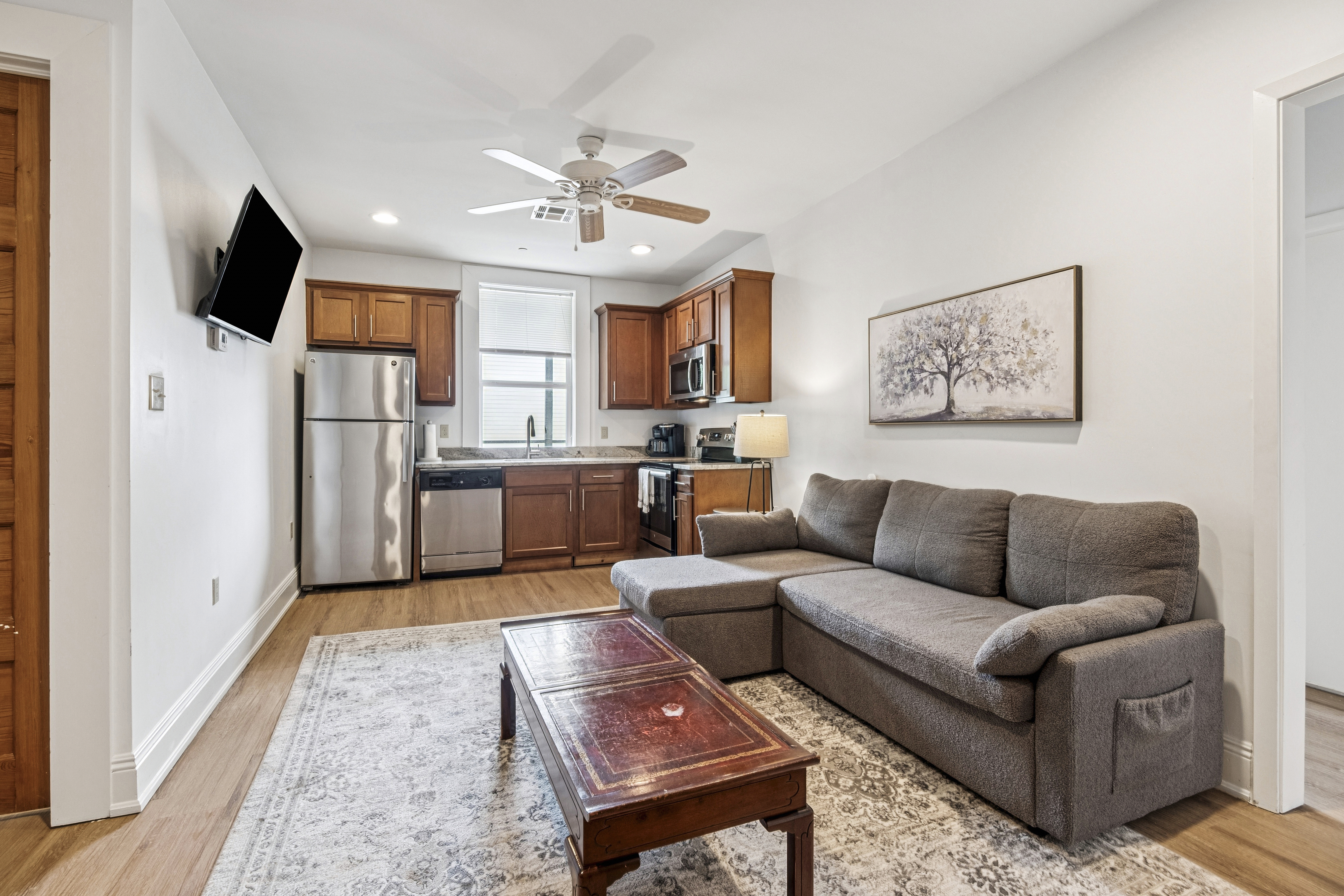 The Two Bedroom at Unit 204, with a private side balcony overlooking Baronne Street