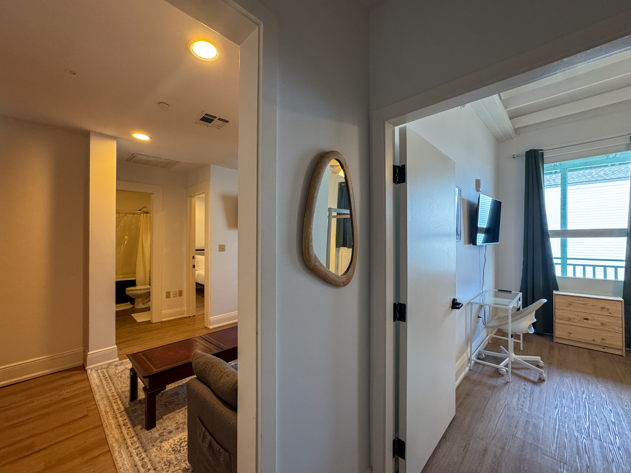 Unit 204 hallway connecting the living room, bath and bedrooms
